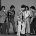 03-02-1979 Jackson 5, Michael, Jermaine, Marlon, Jackie and Tito Jackson at studio in Amsterdam, The Netherlands. 

[keywords]Black & White Image, Posed, Full Length[/keywords]